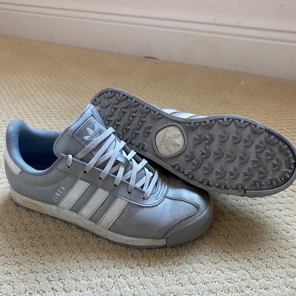 gray and white Adidas “Samoa” sneakers